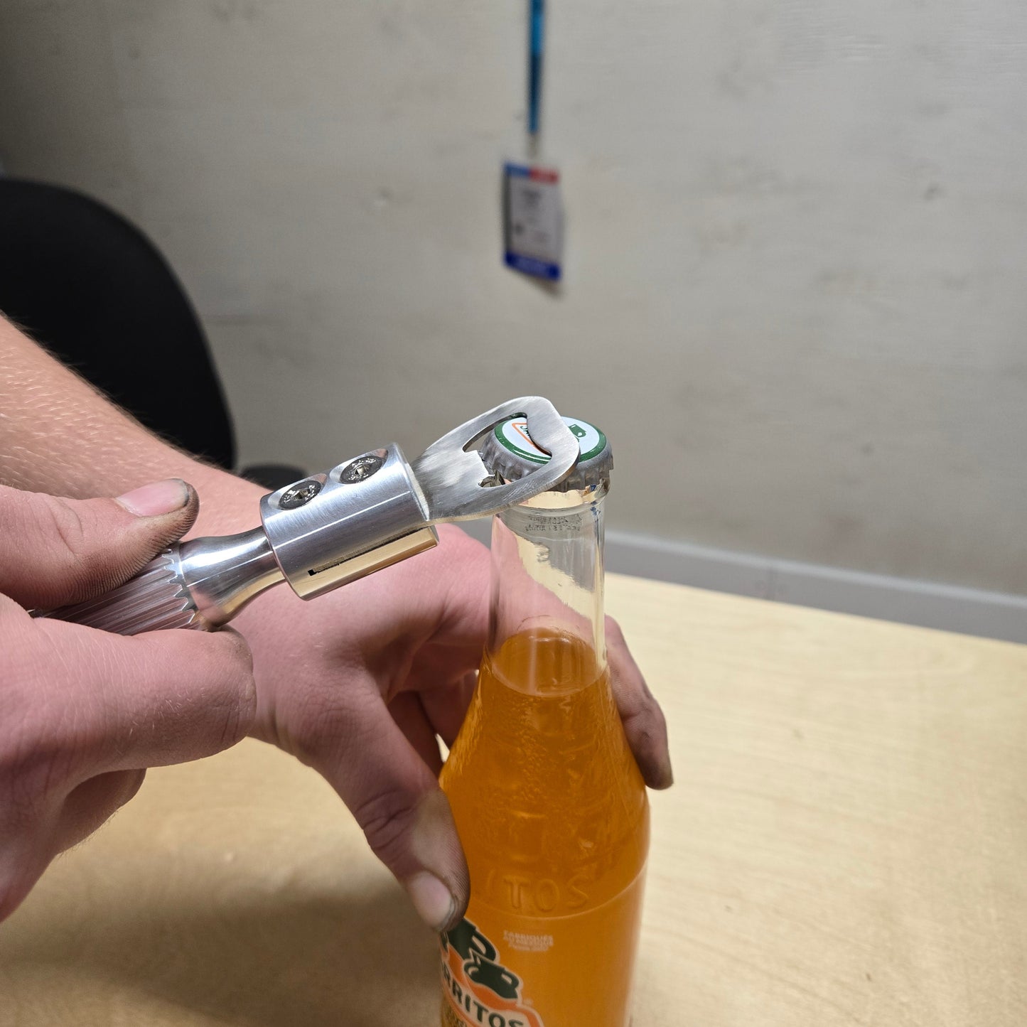 Opening bottle with the tool